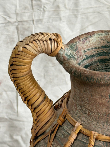 Vintage rattan vessel with handwoven craftsmanship and rustic tone, ideal as a decorative floor vase for warm, nature-inspired interiors — Hommes and Gardens, Pots and Vessels Collection, Vases, Home Decor, Decorative Objects, Boho Rustic Design, Natural Texture, Handcrafted Decor.
