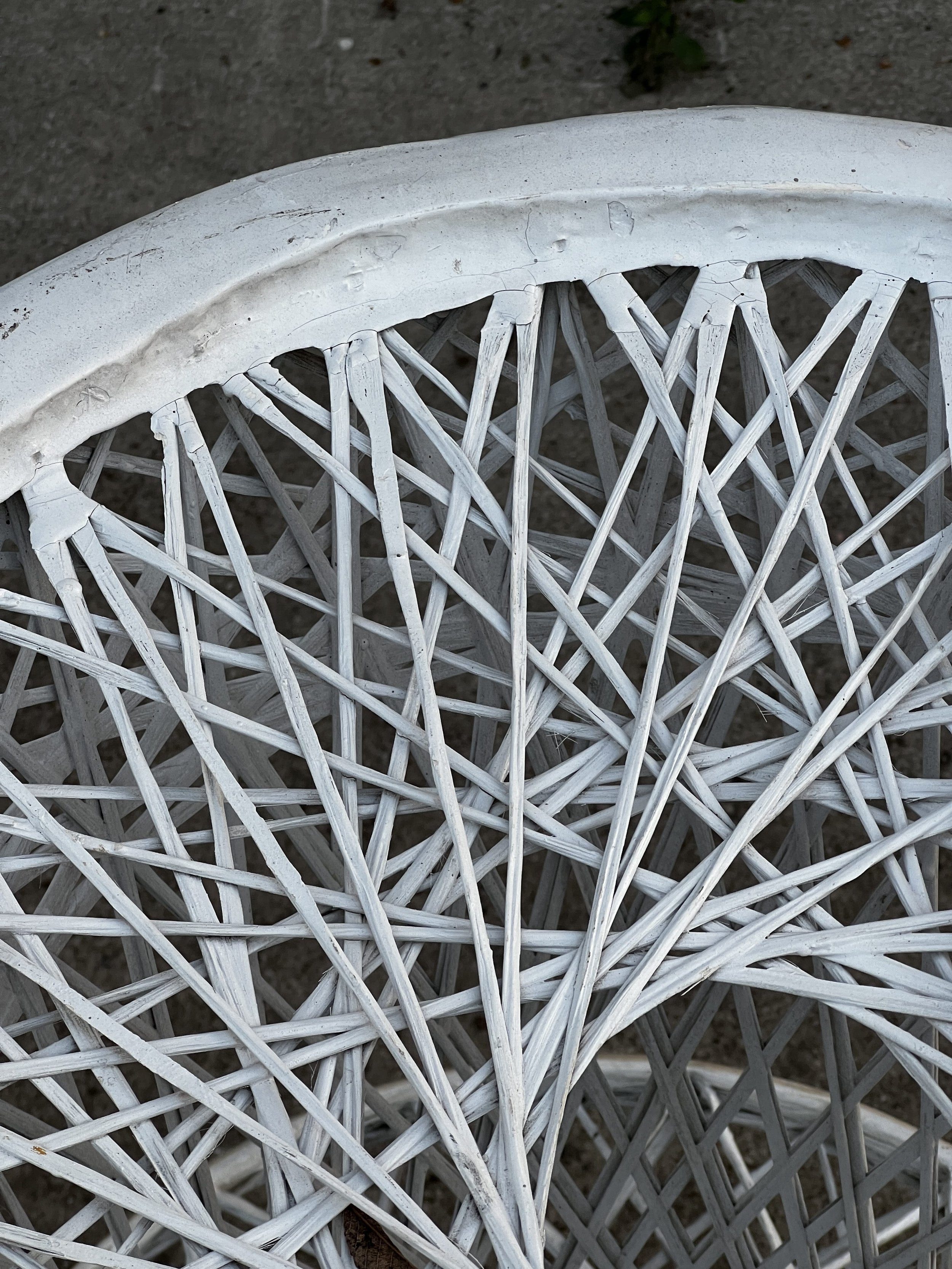 Close-up of the intricate weave of a Pair of Russell Woodard Spun Fiberglass Bar Stools, showing crafted details. hommes + gardens estudio.