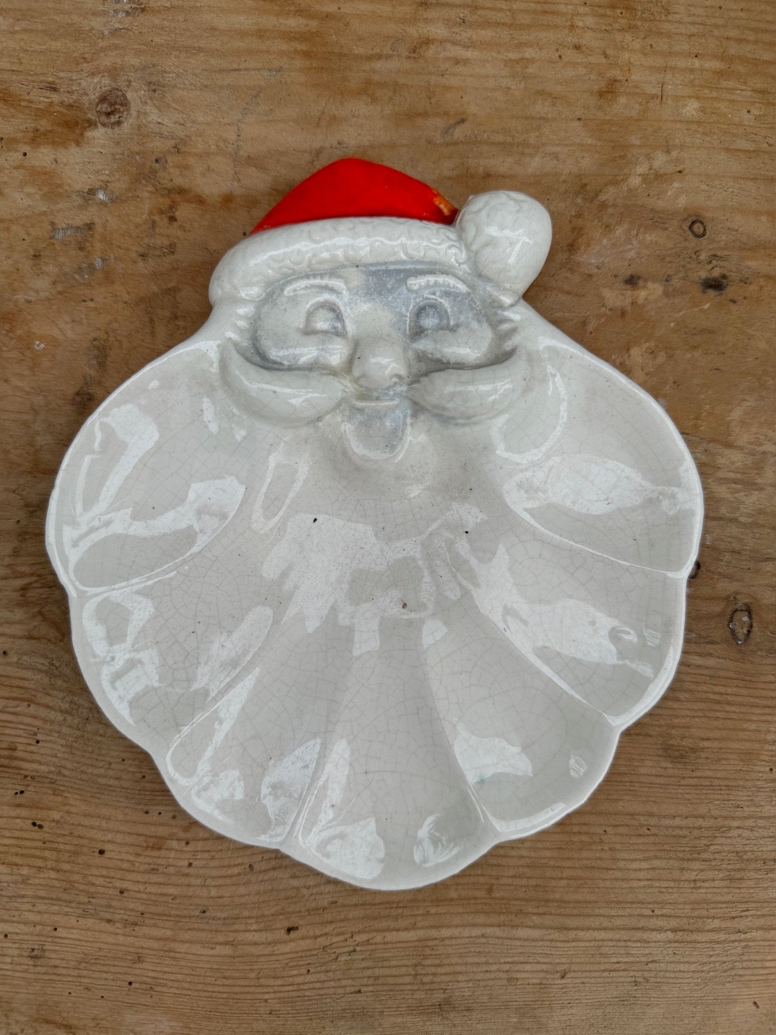 Vintage Christmas Santa Claus Face Plate for serving festive treats, cookies, or candies. Perfect decorative dish for holiday spirit. hommes + gardens estudio.