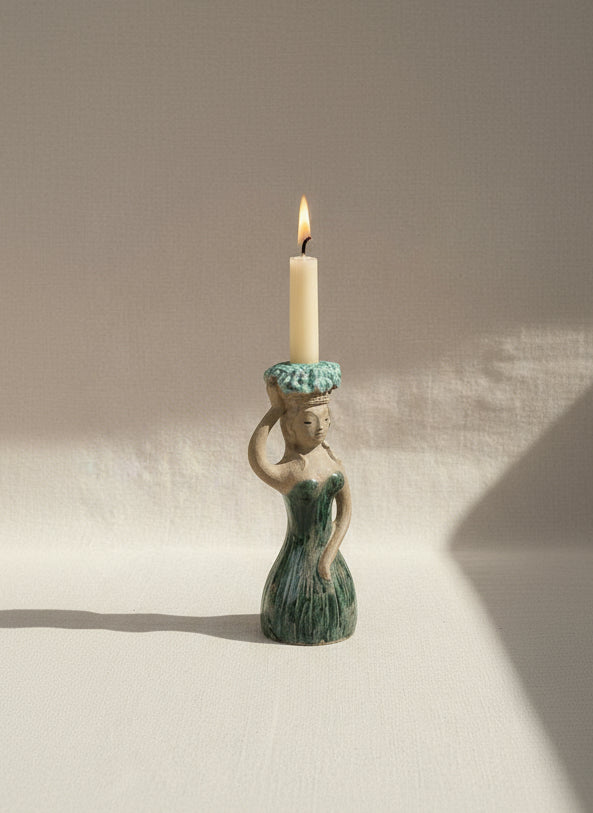Vintage Stoneware Hungarian Mermaid Figurine Candle Holder with a lit candle, showcasing coastal decor charm. hommes + gardens estudio.