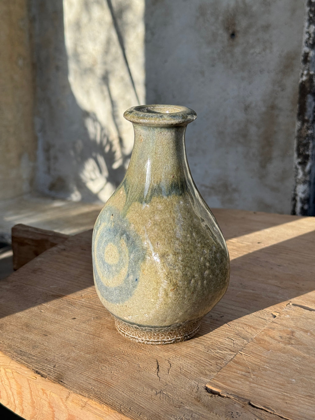 Vintage Glazed Spiral Studio Art Pottery Vase with unique spiral design and gray hue on wooden surface, hommes + gardens estudio.