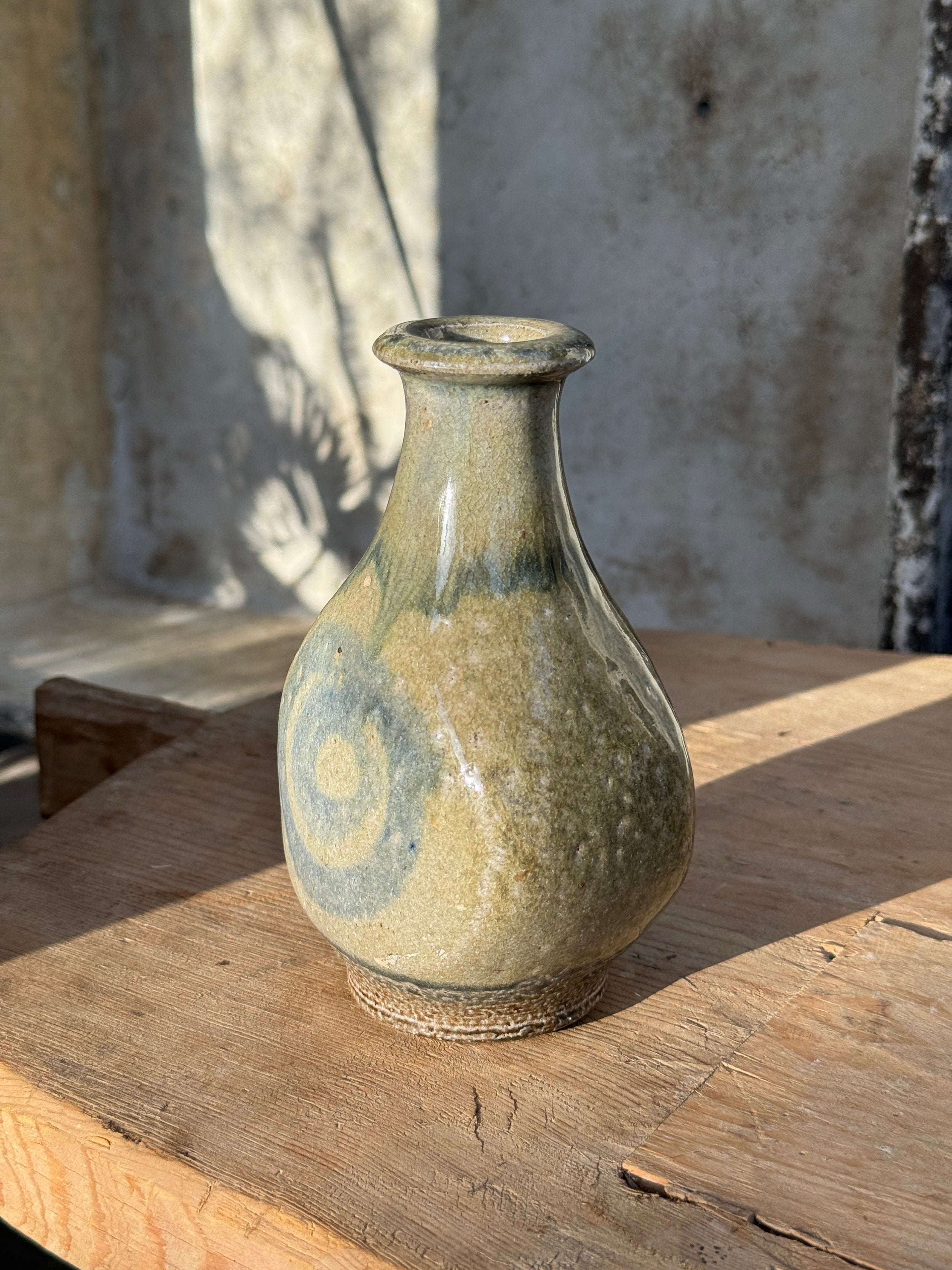 Vintage Glazed Spiral Studio Art Pottery Vase with unique spiral design and gray hue on wooden surface, hommes + gardens estudio.