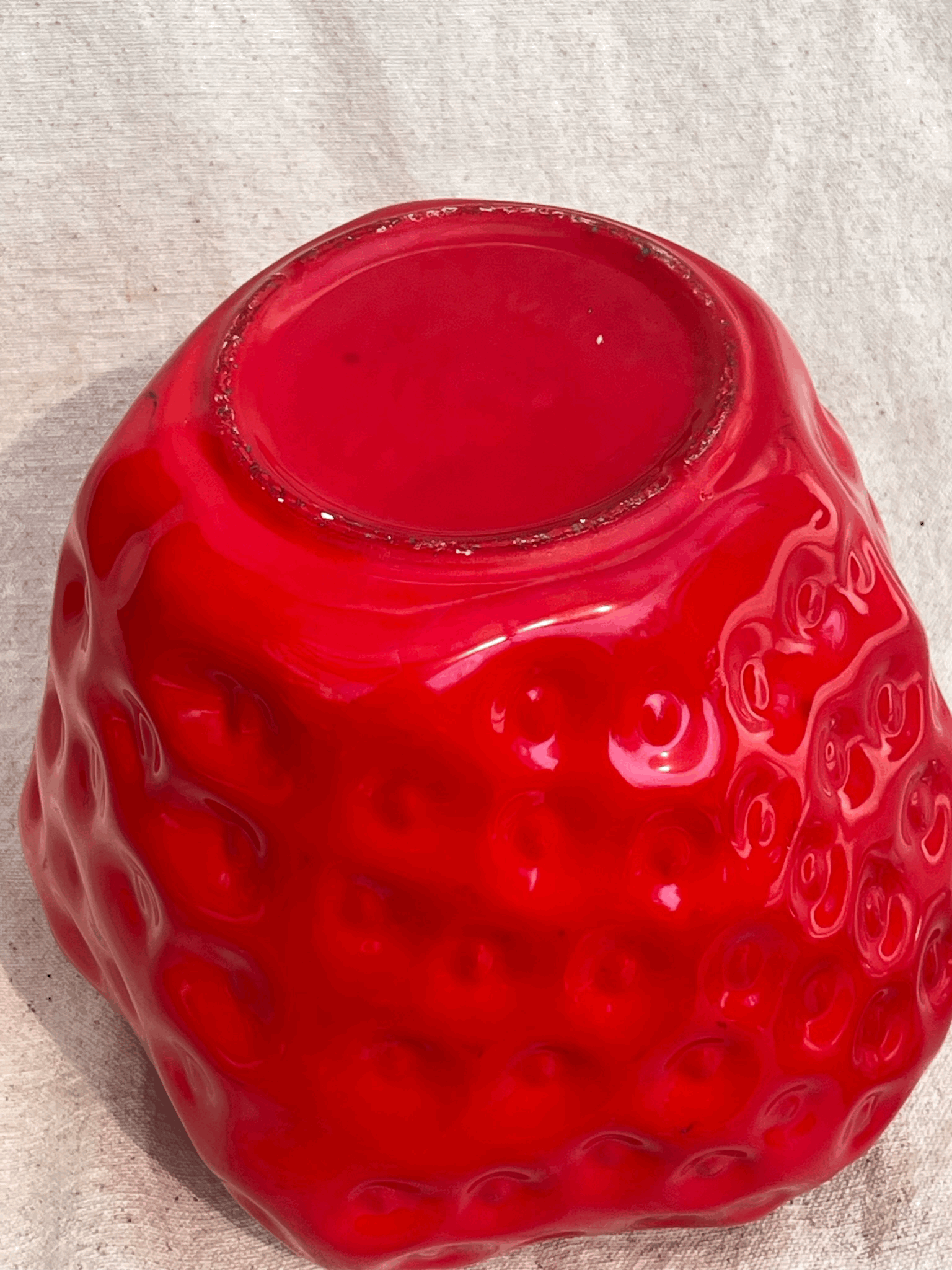 Vintage McCoy Pottery Strawberry Cookie Jar with bold red strawberry design, perfect for kitchen decor. hommes + gardens estudio.