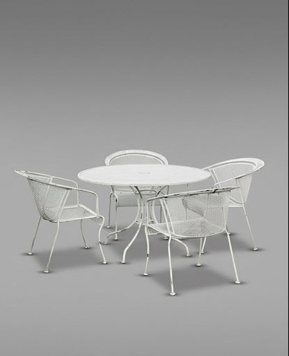 Vintage Woodard wrought iron patio set featuring Briarwood “Daisy Barrel” design with table and chairs, elegant mid-century outdoor furniture with white patina finish — Hommes and Gardens, Furniture Collection, Outdoor Furniture Sets, Patio Decor, Mid Century Modern, Wrought Iron Design, Vintage Outdoor Seating, Garden Furniture, Architectural Patio Accent.