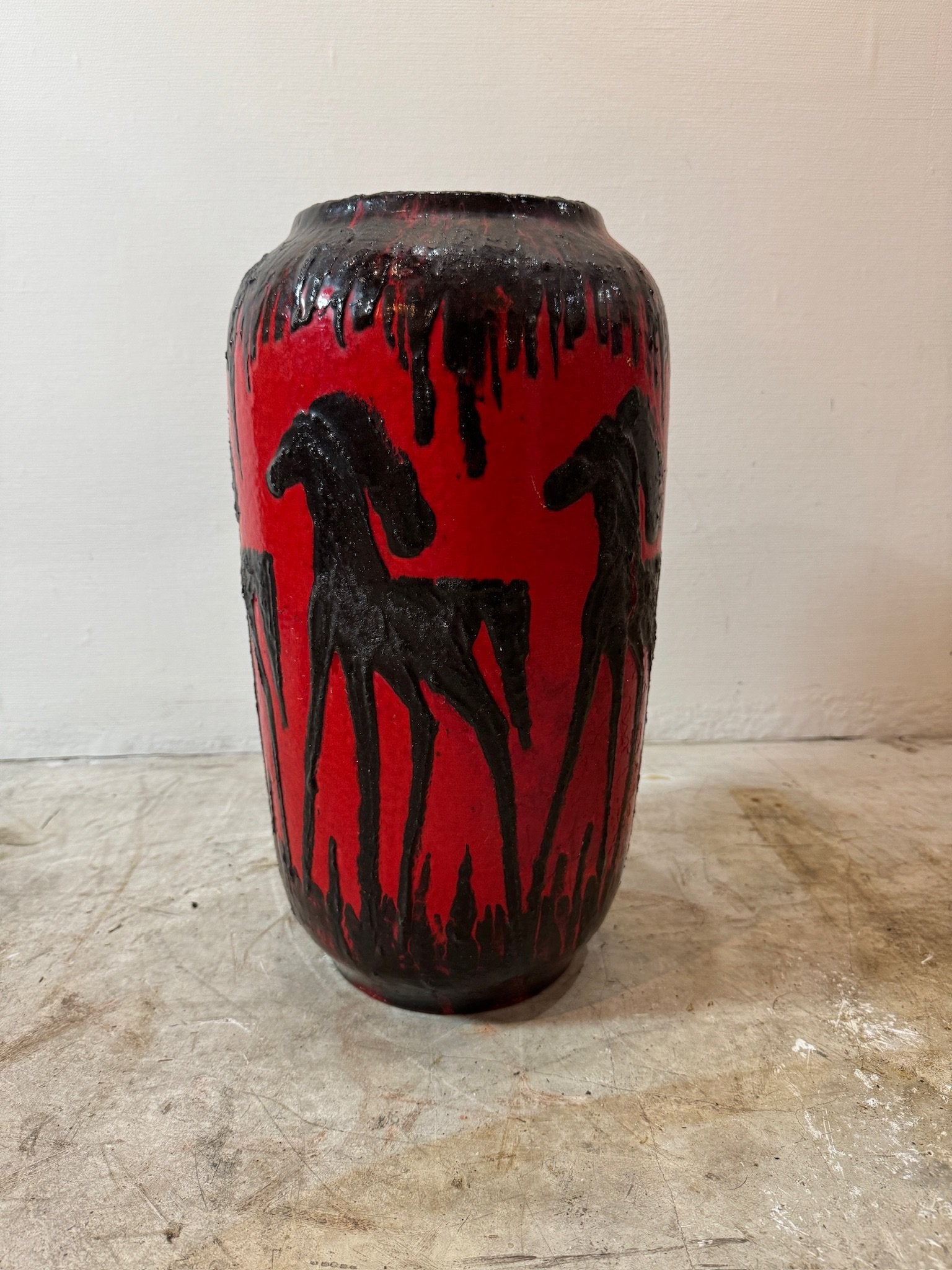 West German Red Fat Lava Horses Vase by Scheurich, 1960s with dark equine motifs in bold red and black colors. hommes + gardens estudio.
