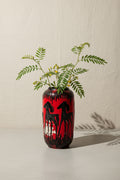 West German Red Fat Lava Horses Vase by Scheurich, 1960s with foliage, showcasing its striking design. hommes + gardens estudio.