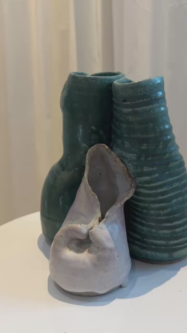 Handmade ceramic sculpture with organic triple-form structure, green and off-white contrasting glazes, and textural matte-gloss balance, collectible art decor — Hommes and Gardens, Pots + Planters Collection, Landscape Architect, Interior Designer, Outdoor Living, Art, Furniture, Objects, Best Gifts, Nature, Backyard, Yard, Outdoor Decorations, Home Decor, Home Design, Luxury Design.