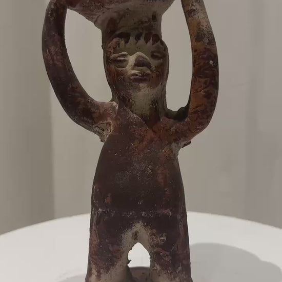 360-degree video of Pre-Columbian style terracotta ritual figure with raised arms and bowl, showcasing its handcrafted primitive design and aged patina — Hommes and Gardens, Home Decor Collection, landscape design, plant design, Landscape Architect, Interior Designer, Outdoor Living, Outdoor Decorations, Home Design, Luxury Design, Art, Furniture, Objects, Best Gifts, Nature, Backyard, Yard.